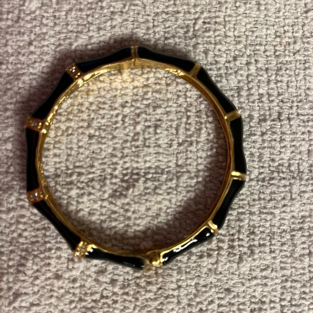 Black bamboo enamel (synthetic) bracelet. Hinged.